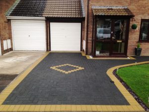paving a driveway with pavers